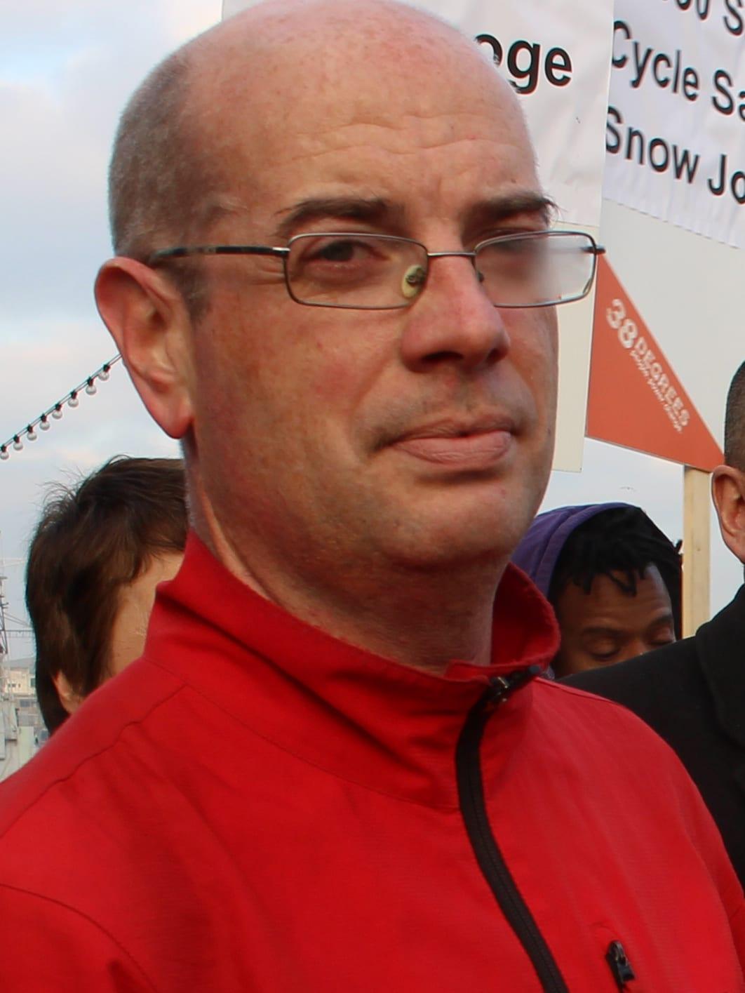 Andrew Gilligan beside the Thames outside City Hall, London, 2013