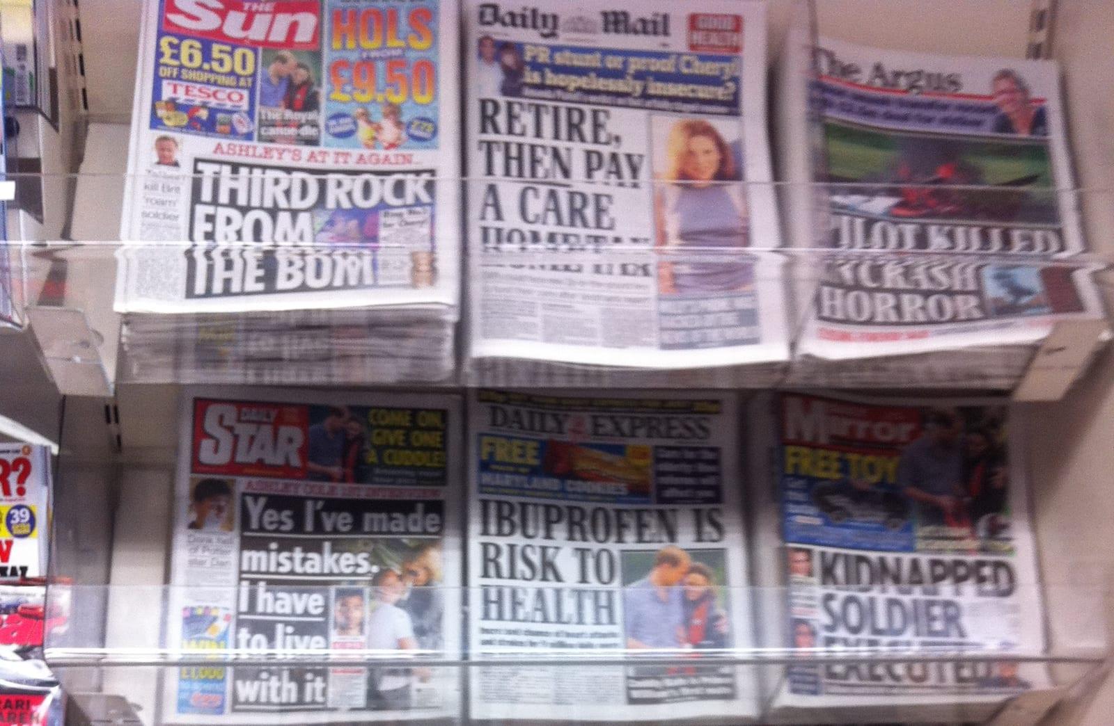 British newspaper front pages laid out together