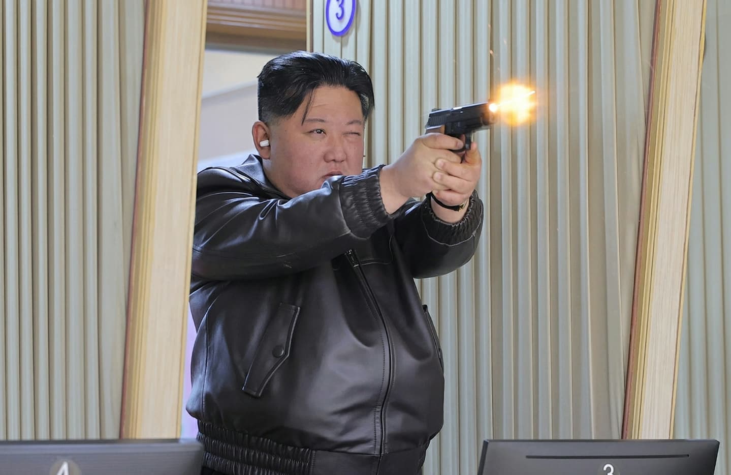 North Korean leader Kim Jong Un grooms daughter Ju Ae firing pistols at munitions factory