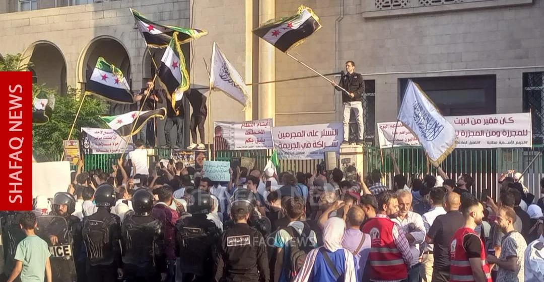 Damascus... a protest rally calling for the implementation of Article 49 of the Constitutional Declaration.