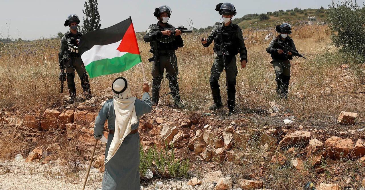 Israeli Forces And Settlers Escalate Violence Across West Bank, Torching Mosques And Homes