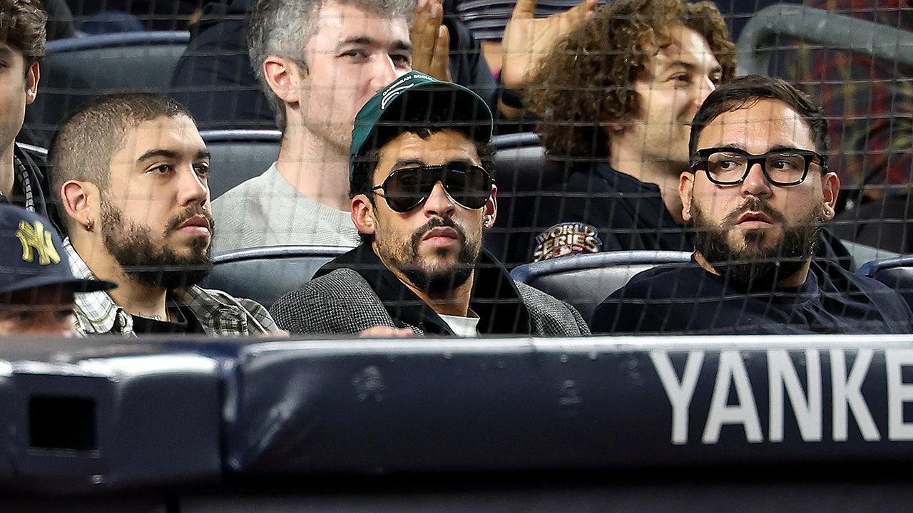 Bad Bunny Sparks Outrage by Sitting During 'God Bless America' at Yankees Playoff Game