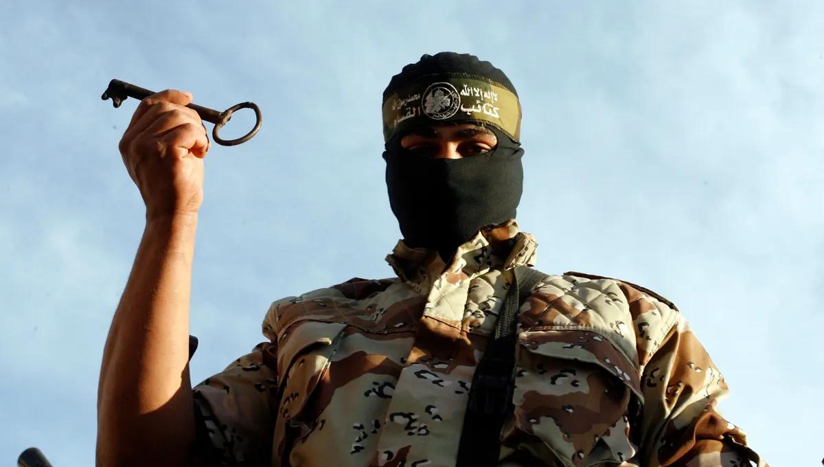 Hamas Parades Armed Fighters In Gaza After Ceasefire, Israel Strikes Kill Palestinians