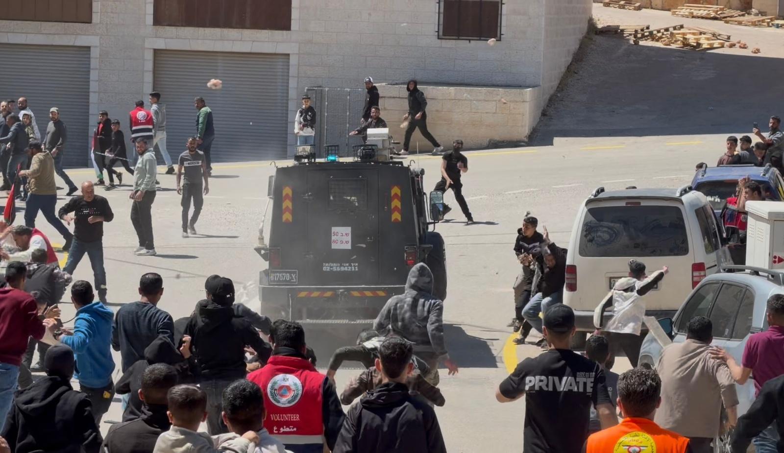 Israeli Forces Fire Tear Gas at Funeral in Al-Mughayyir, East of Ramallah