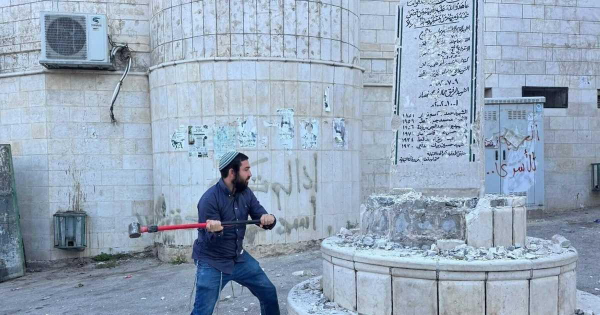 Zvi Sukkot Smashes Palestinian Martyrs' Monument in Madama, Nablus Area With Israeli Troops