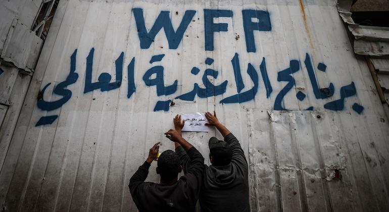 Crowds in Central Gaza stormed a WFP warehouse, killing two and injuring several.
