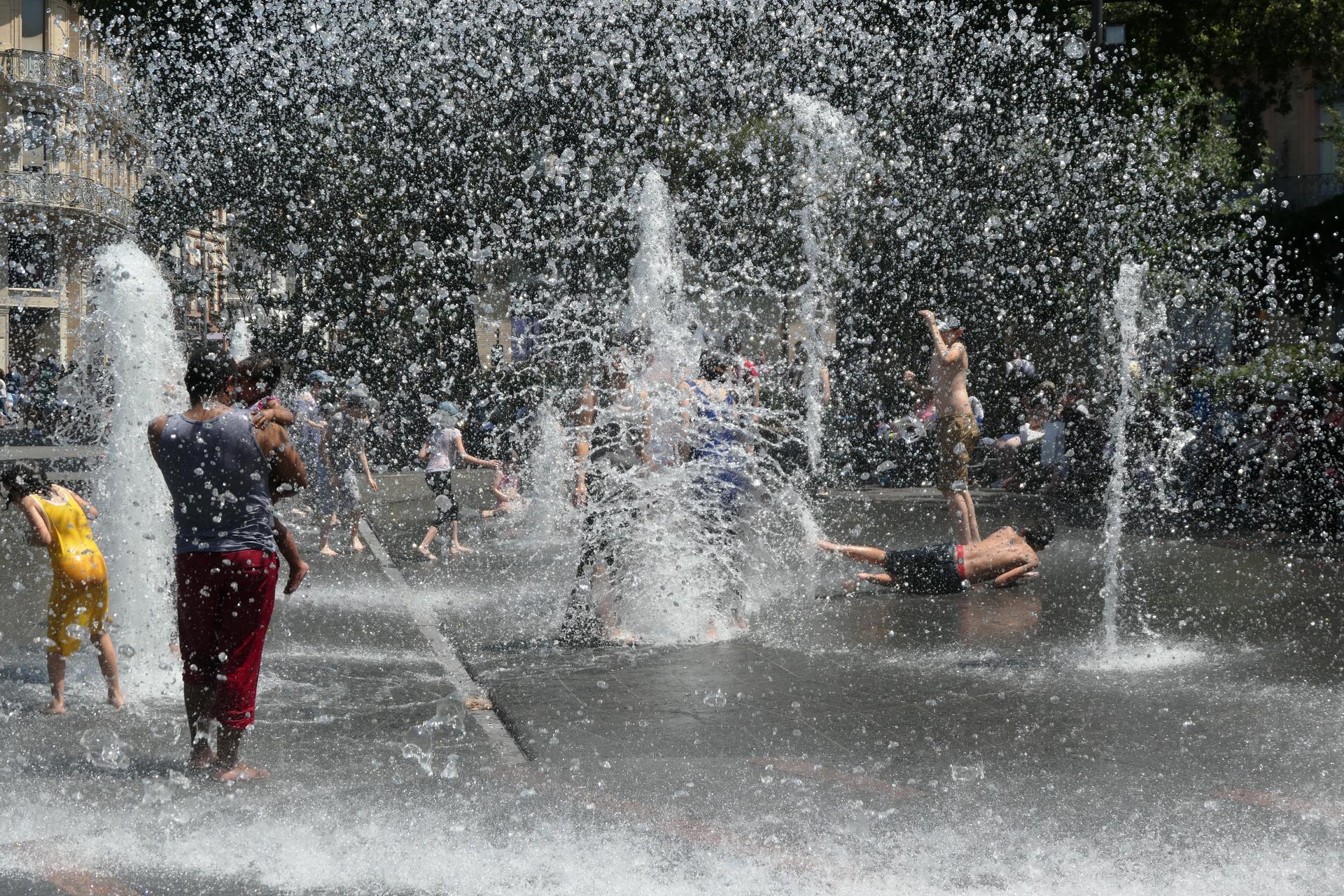 UK heatwave spreads further north and west as temperatures continue to climb