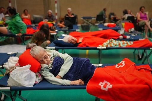 Wildfires Force 92,000 Evacuations in France and Spain, Macron Seeks EU Reinforcements