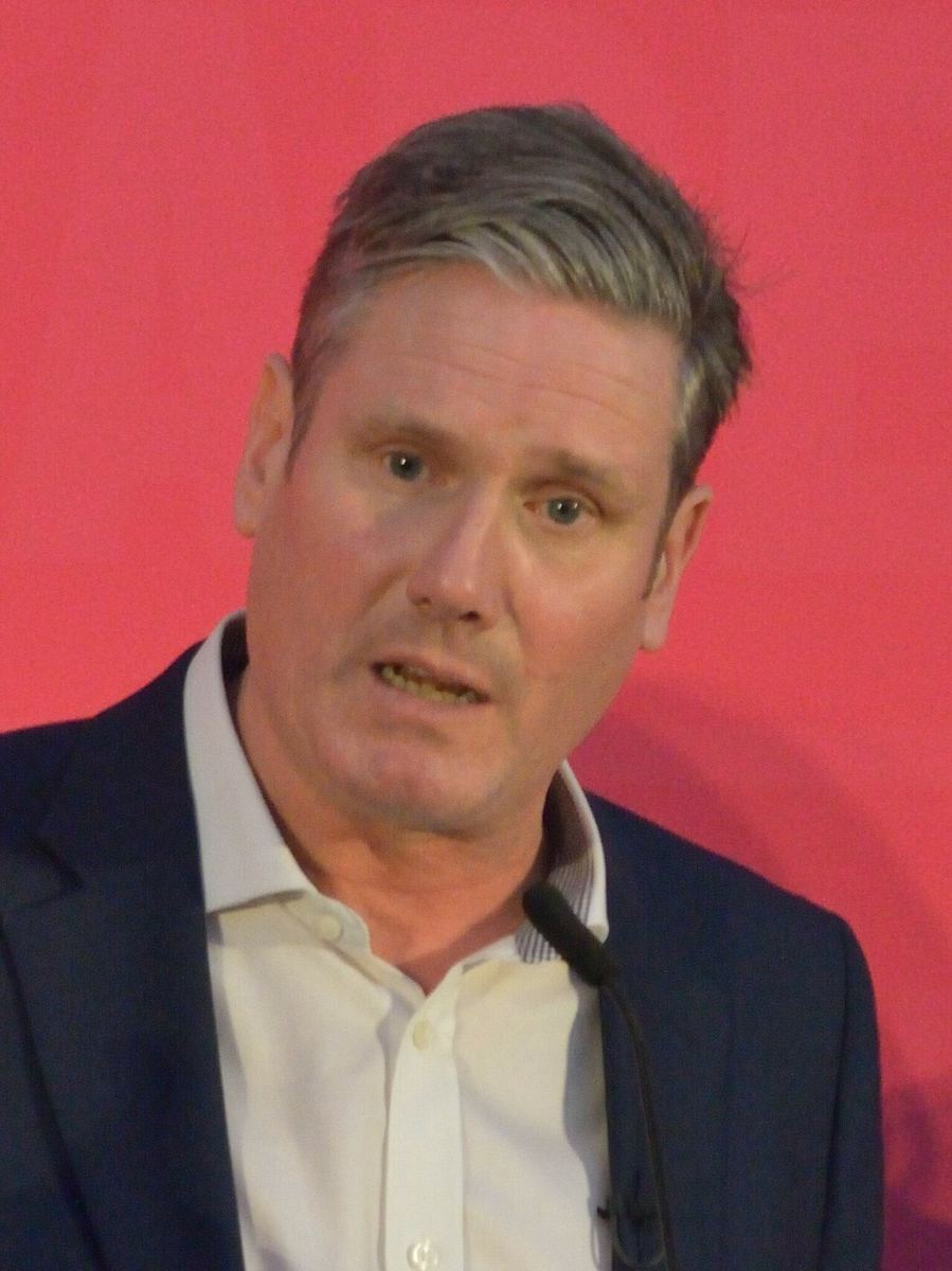 Close portrait of man speaking at a microphone