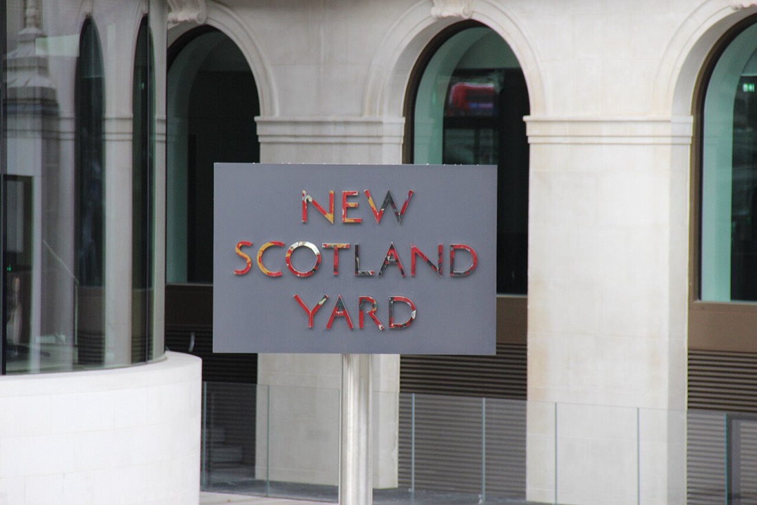 The revolving New Scotland Yard sign outside the Metropolitan Police headquarters on Victoria Embankment, London